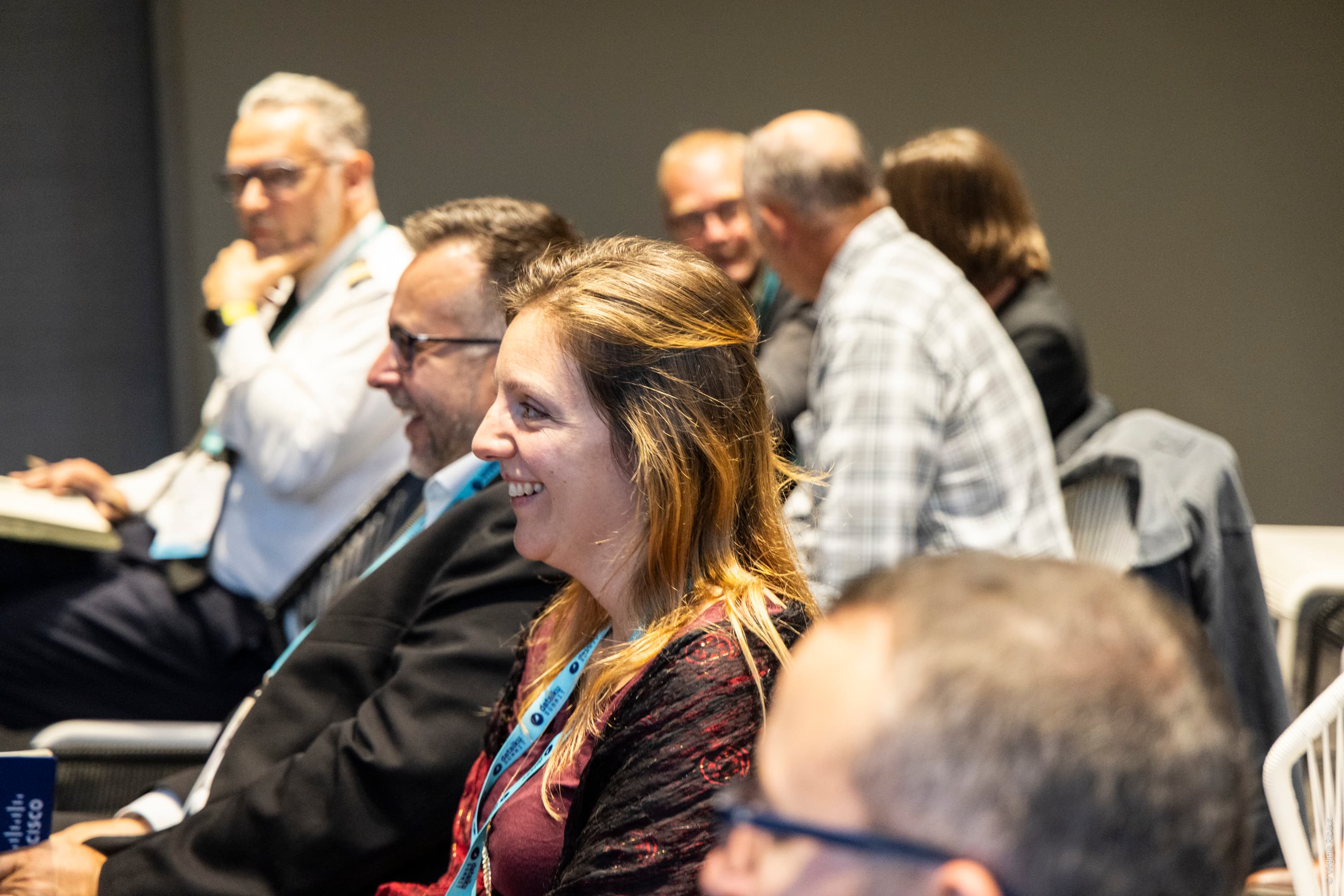 People smiling during an event